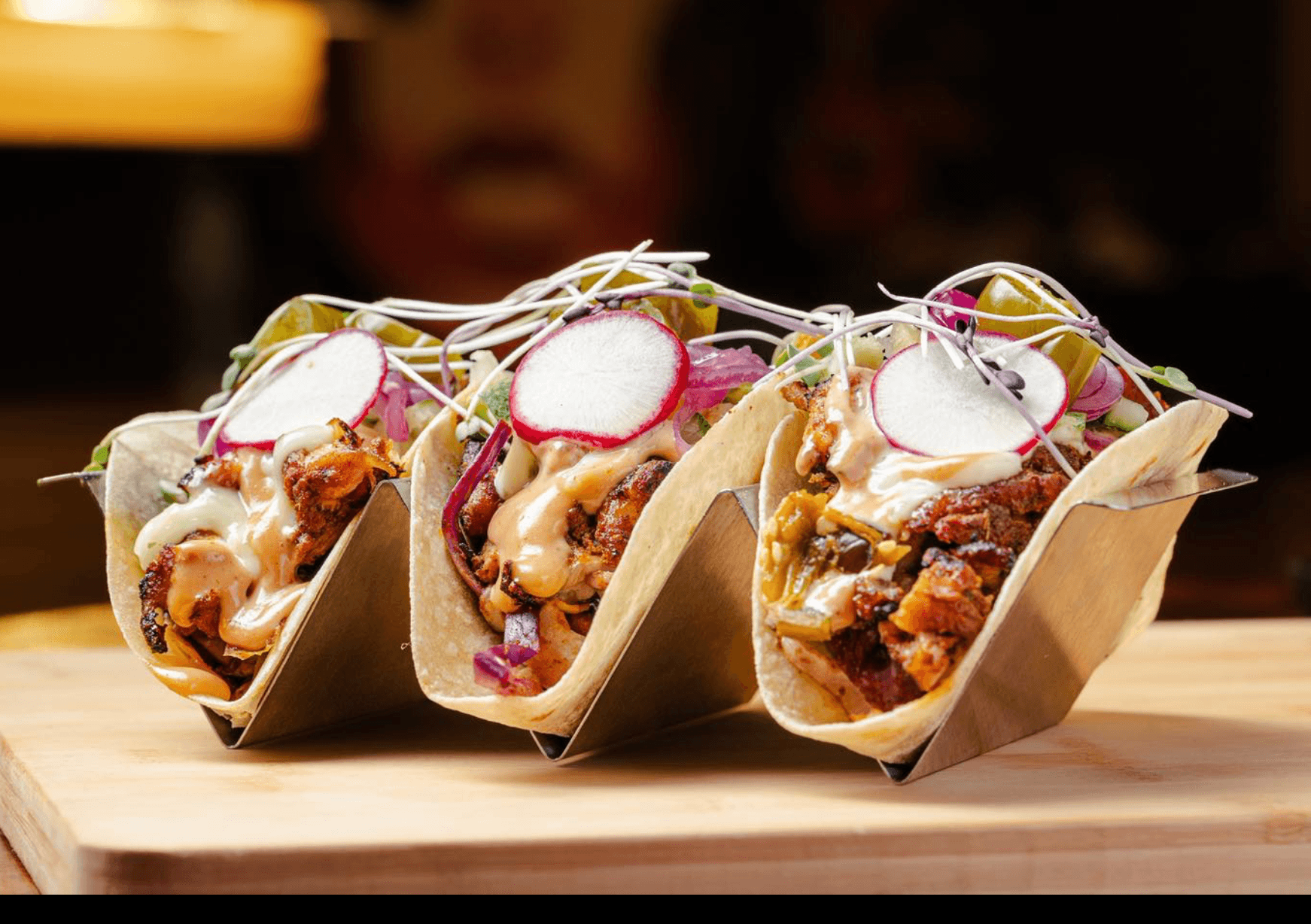 Okopipi Tropical Grill logo